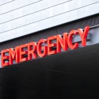 A color photo showing an emergency room sign. Credit: Shutterstock